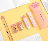 CatPaw na cor branca com lápis, régua e apontador